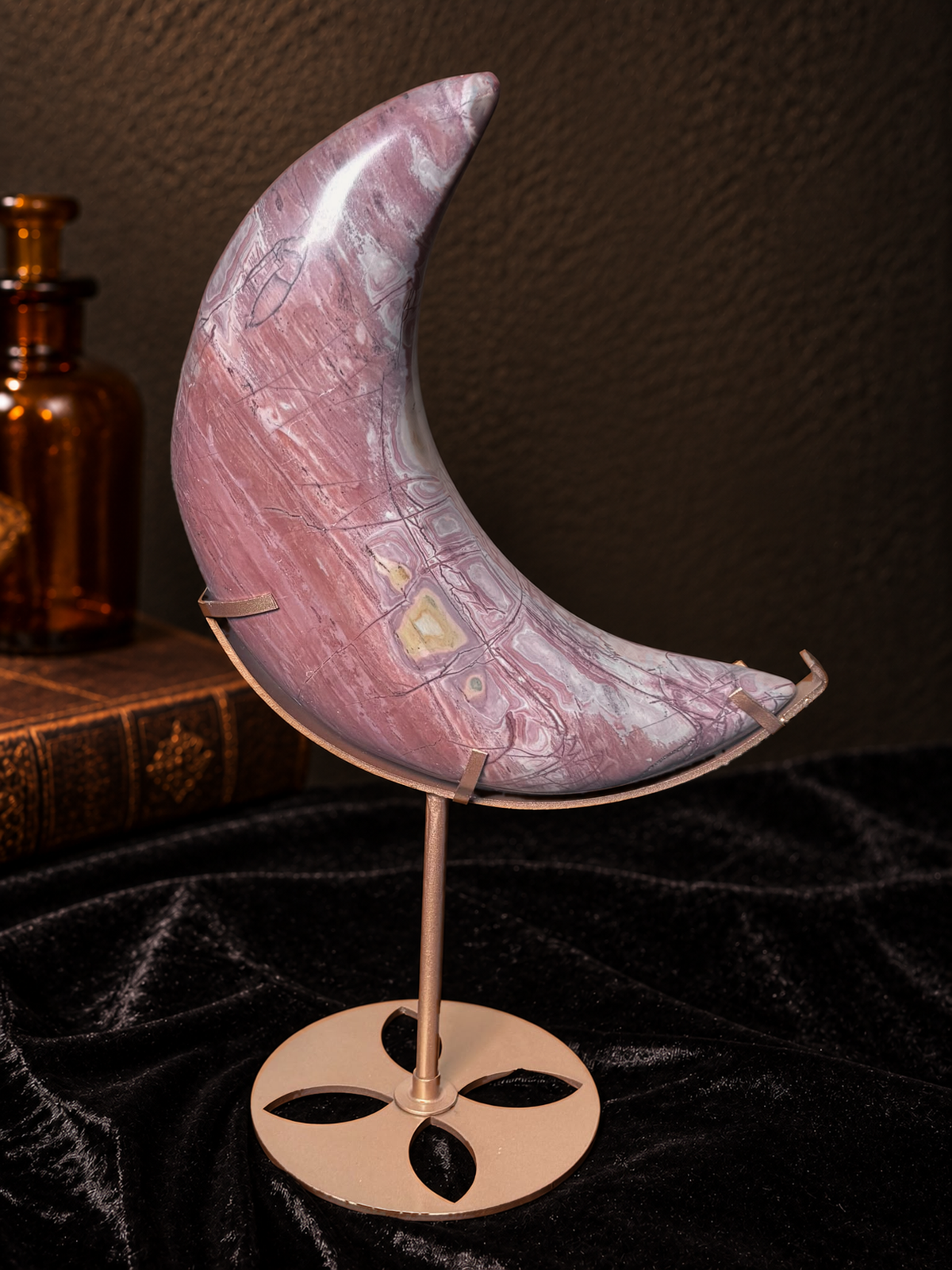Reverse of large Pink Picture Jasper crescent moon showing rose pink, cream and grey patterning on gold-toned stand