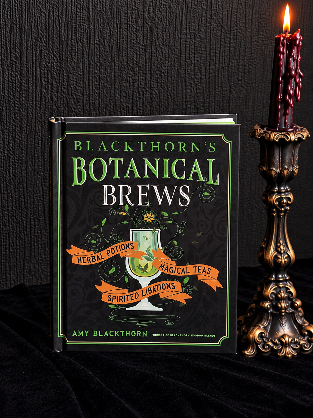 Blackthorn's Botanical Brews by Amy Blackthorn, black hardcover book with green botanical details and an illustrated potion glass on the cover.