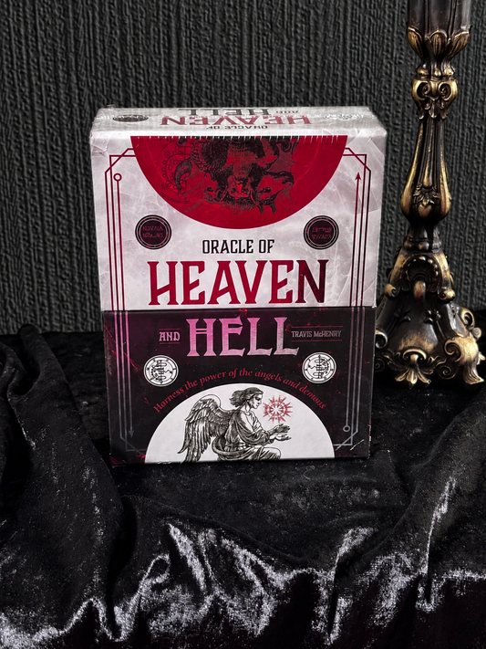 Oracle of Heaven and Hell by Travis McHenry, red, white and black oracle deck box featuring angelic imagery, occult seals and traditional esoteric illustrations.