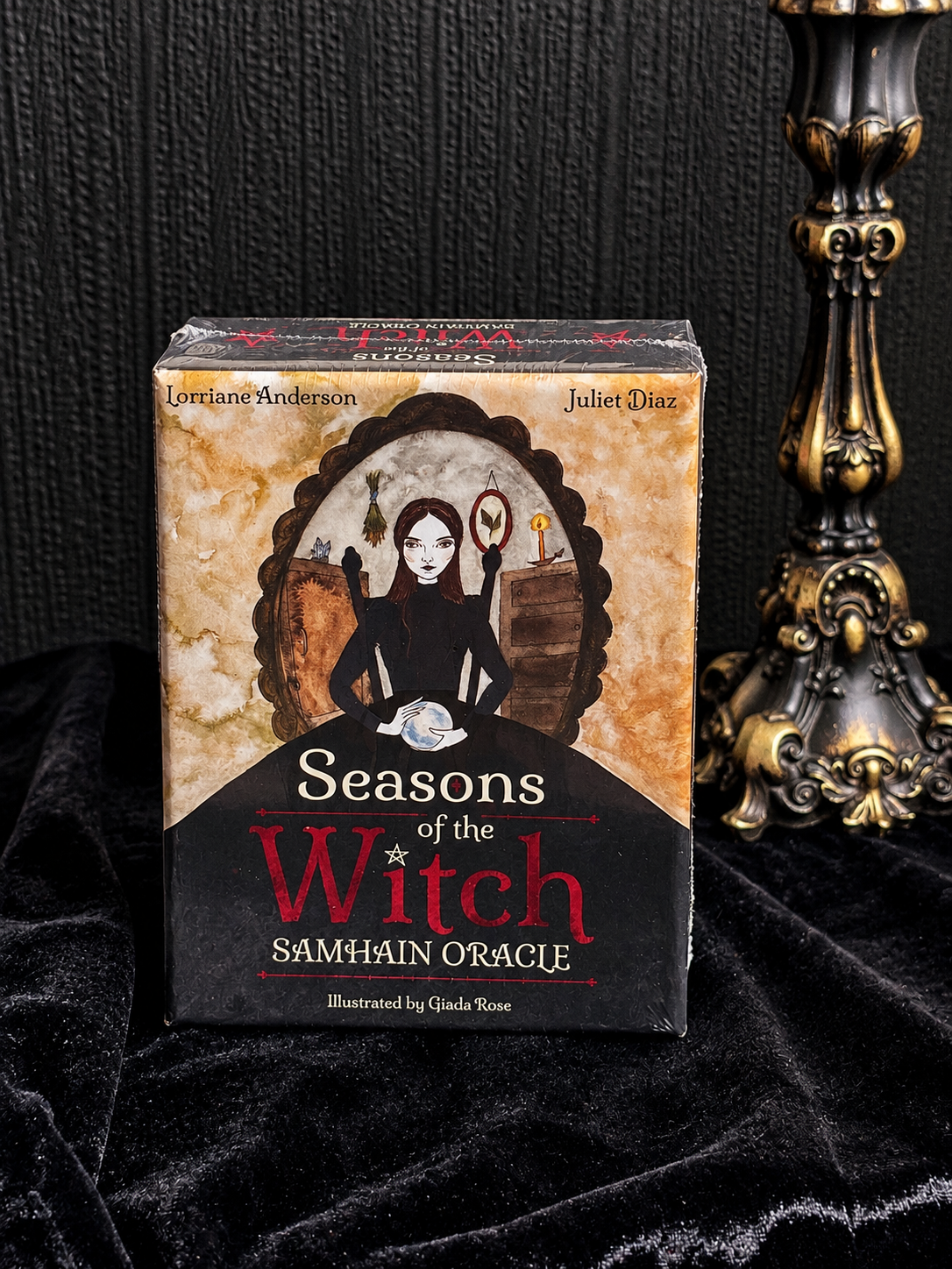 Seasons of the Witch Samhain Oracle by Lorraine Anderson and Juliet Diaz, featuring dark illustrated artwork of a witch holding a crystal ball.